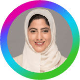 Small circular headshot of HH Sheikha Shamma bint Sultan bin Khalifa Al Nahyan, co-founder of Aurora50, with rainbow-spectrum circle border