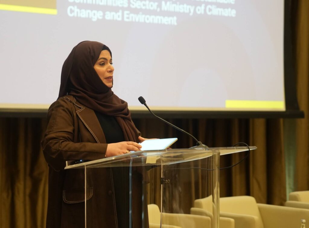 Chapter Zero UAE launch - HE Alya Al Harmoodi, Assistant Undersecretary of the Sustainable Communities Sector at the Ministry of Climate Change, speaks on stage at a perspex podium