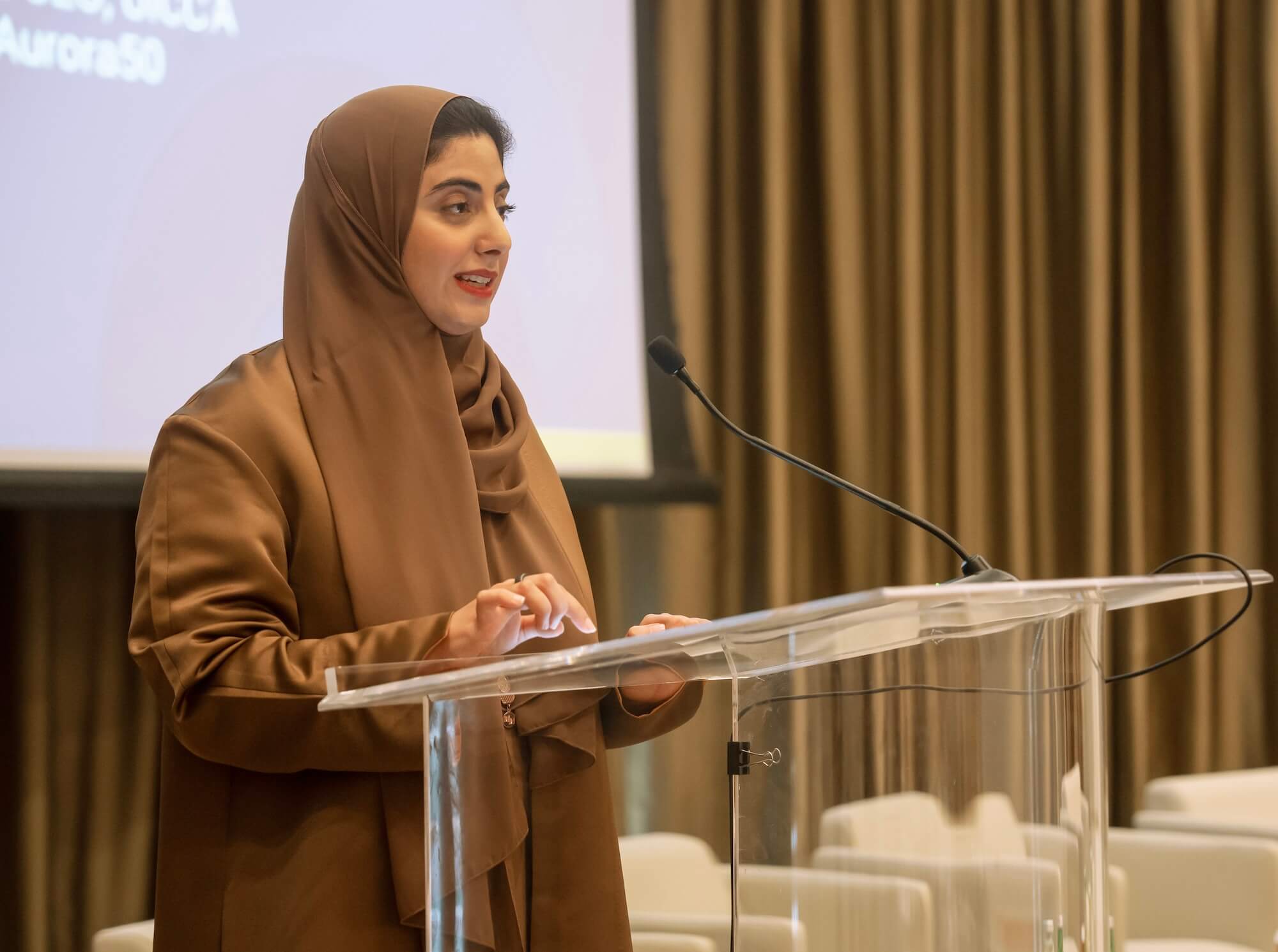 Aurora50 co-founder HH Sheikha Shamma bint Sultan bin Khalifa Al Nahyan speaks at the perspex podium at the Chapter Zero UAE launch