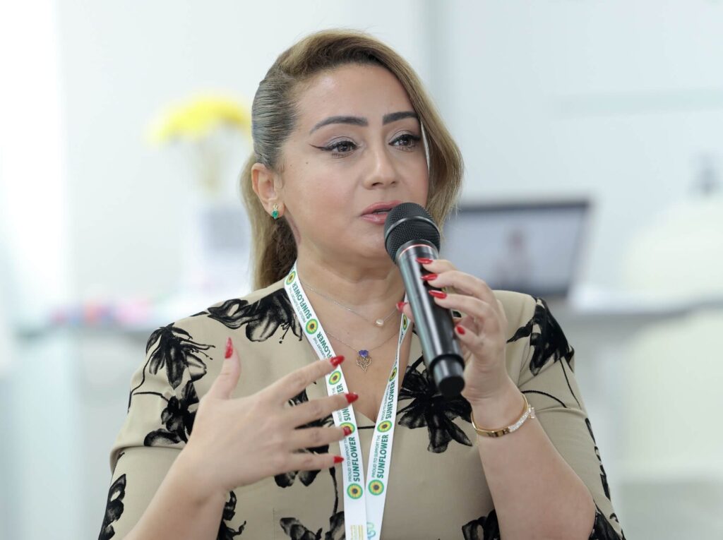 Sara Bachar, People of Determination Senior Specialist at Abu Dhabi Department of Community Development (DCD), speaking at Aurora50's Inclusive Workplaces Summit in November 2024.