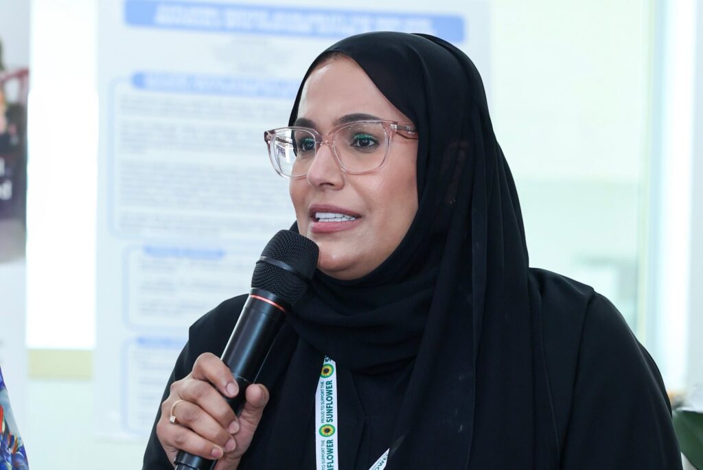 Eman Altamimi, Director of the Program Development and Quality Office at Zayed Higher Organization (ZHO), speaking at Aurora50’s Inclusive Workplaces Summit 2024 at Zayed Higher Organization in Abu Dhabi on Preparing POD for Employment.