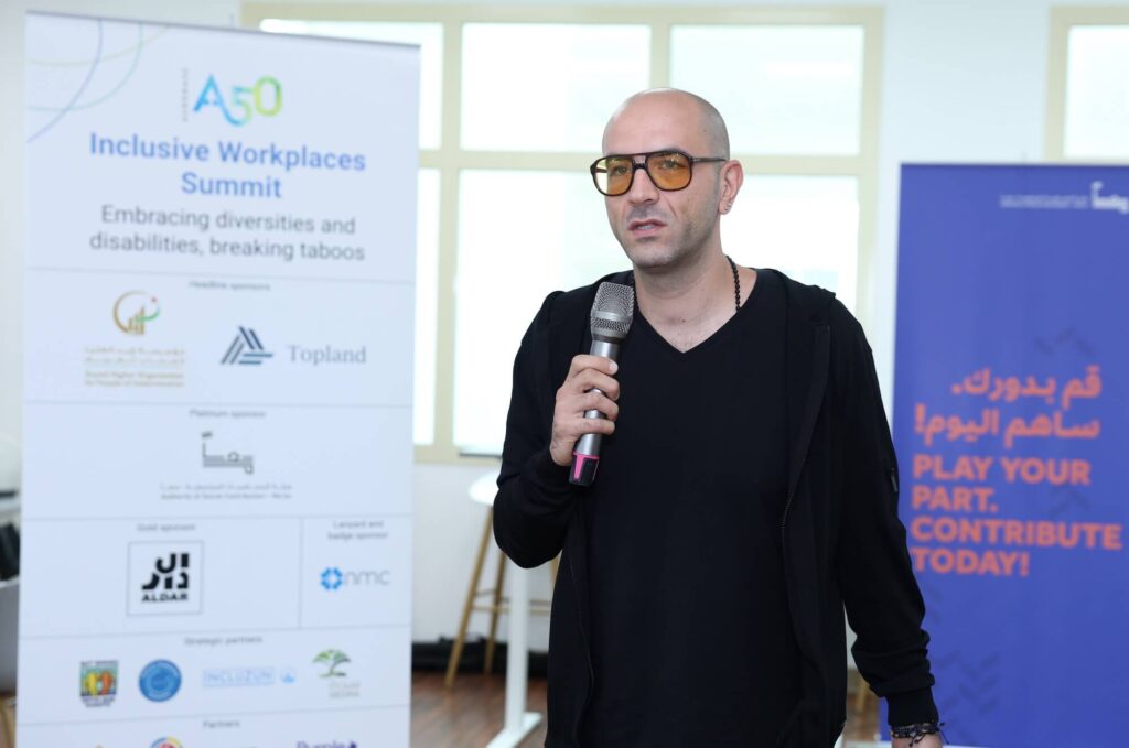 Nadi Choueiri, sound engineer, lead DJ instructor and founder of Spin Music Dubai, speaking at Aurora50's Inclusive Workplaces Summit at Zayed Higher Organization in November 2024.