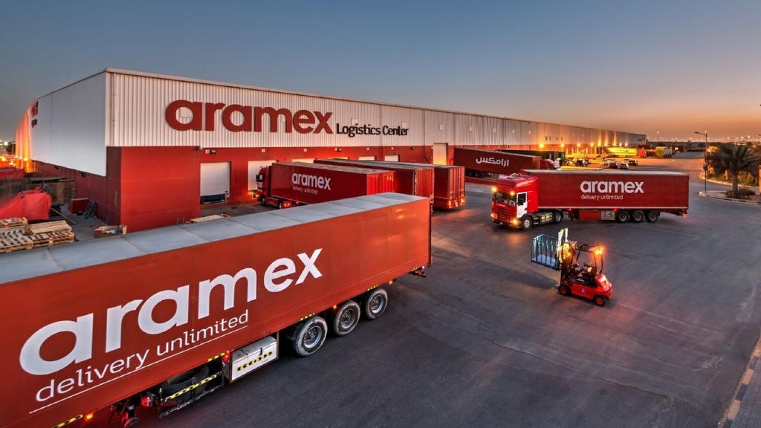 Aramex trucks outside abanAramex logistics centre